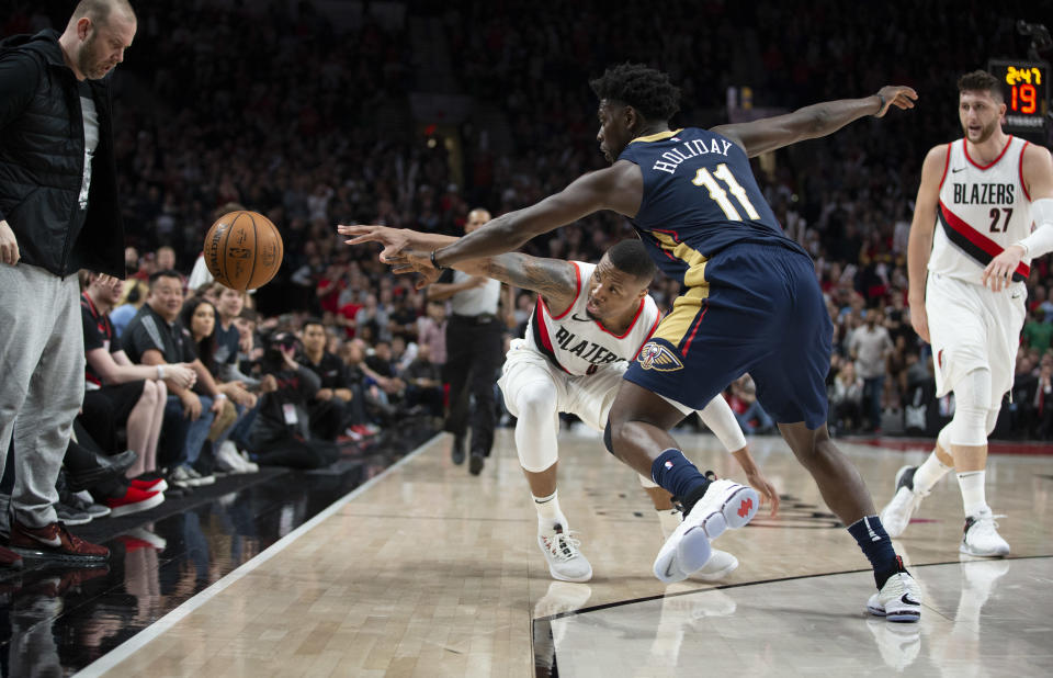 The Pelicans’ Jrue Holiday disrupted the rhythm of Blazers All-Star Damian Lillard throughout Game 1. (AP)