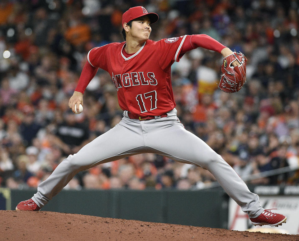 Shohei Ohtani delivers a pitch during the sixth inning against the Astros in Houston. (AP Photo)