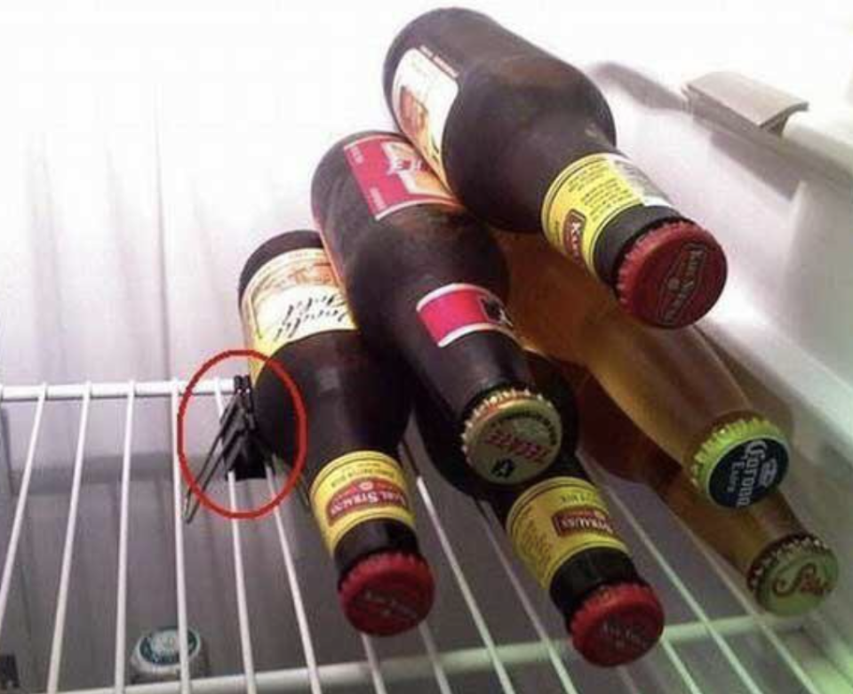 clip on a fridge shelf to keep beer in place