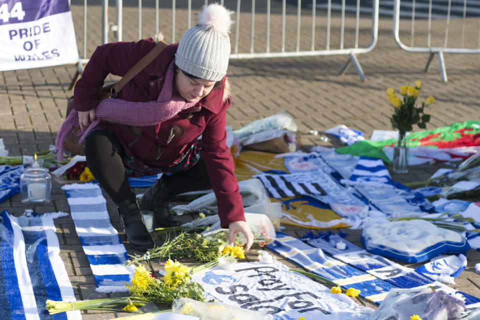 <p>Cardiff fans place tributes for missing striker Emiliano Sala (Getty Images) </p>