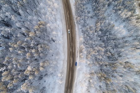 FILE PHOTO: An aerial view shows a road on the banks of the Yenisei River, outside city of Krasnoyarsk