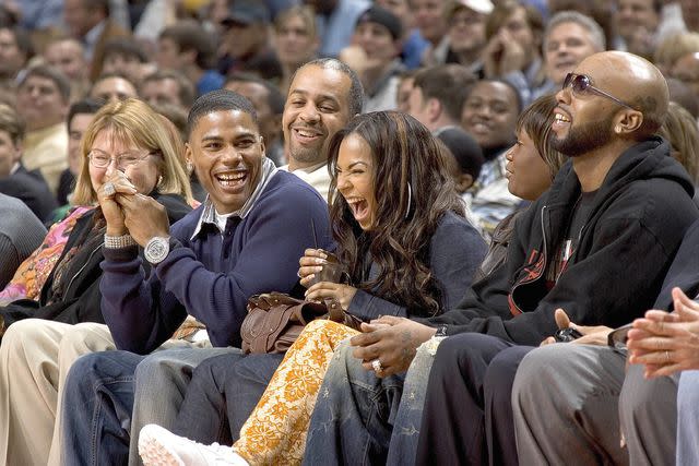 <p>Kent Smith/NBAE via Getty </p> Nelly and Ashanti in 2006