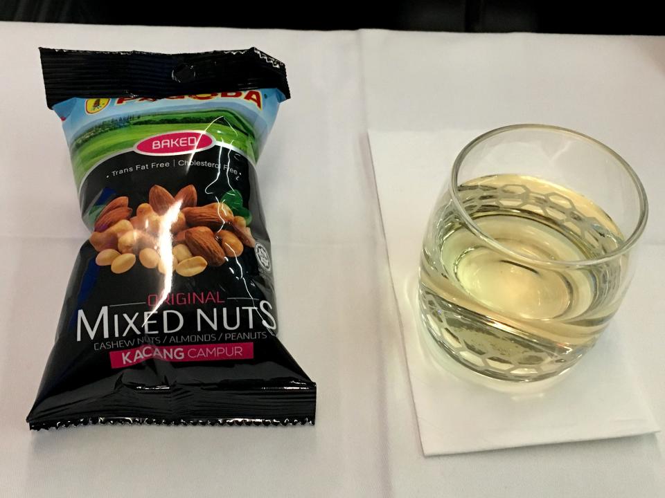 snacks on plane and wine