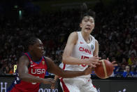 United States' Chelsea Gray , left, knocks the ball out of China's Han Xu hands during their gold medal game at the women's Basketball World Cup in Sydney, Australia, Saturday, Oct. 1, 2022. (AP Photo/Mark Baker)