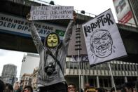 Protestor in Kuala Lumpur on August 29, 2015 are demanding Prime Minister Najib Razak’s resignation over corruption charges and are angry about a new consumption tax they blame for causing prices to spike