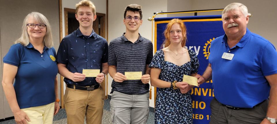 Rotary Club Treasurer Sue Burwell, left, and past president as well as former Loudonville High principal Ben Blubaugh, right, pose with Rotary Club Scholarship Winners, from left, Ashten Henley, Wesley Zuercher, and Catlyn Kauffman.