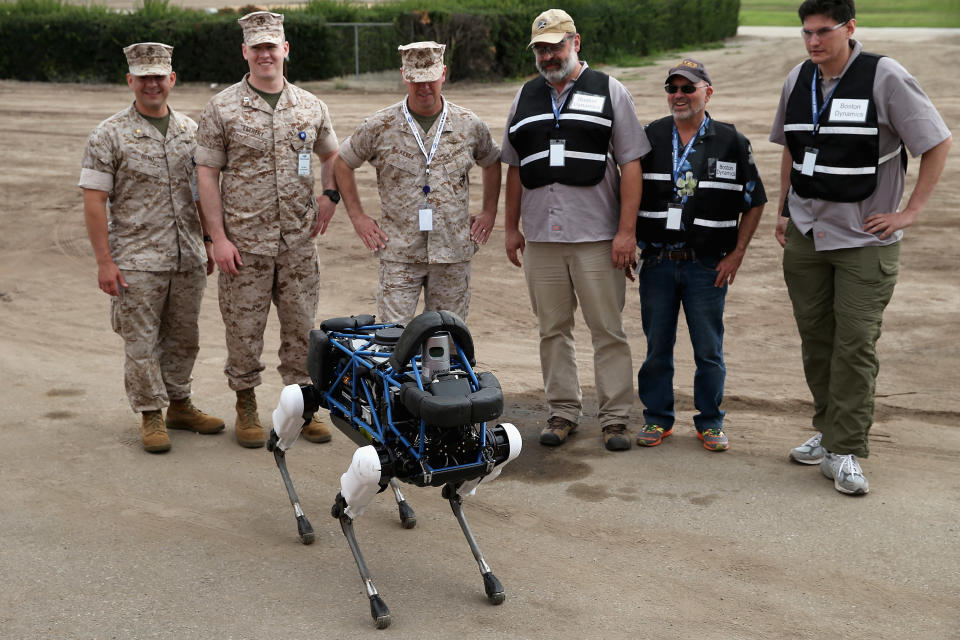Boston’s dog: United States Marines and representatives from Boston Dynamics look at Spot, a four-legged robot designed for indoor and outdoor operation. Photo: Chip Somodevilla/Getty Images