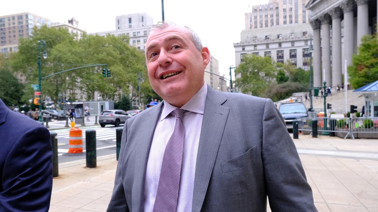 A smiling Lev Parnas arrives at Manhattan Federal Court ahead of opening arguments in his trial.