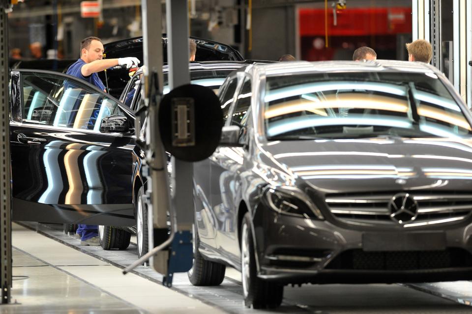 A worker polishes a car in the assembly hall in the new Mercedes Benz plant in Kecskemet, 83 kilometers southeast of Budapest, Hungary, prior to the the official inauguration ceremony of the Kecskemet Mercedes factory on Thursday, 29 March, 2012. The new Mercedes plant built on a basic territory of 441 hectares with an investment of 800 million euros has a yearly capacity of 100,000 cars of two types of compact B-Class produced by 2,500 employees. (AP Photo/MTI, Tamas Kovacs)