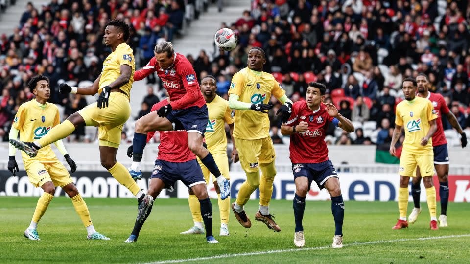 Yusuf Yazıcı scores his team's first goal against Golden Lion FC. - Sameer Al-Doumy/AFP/Getty Images