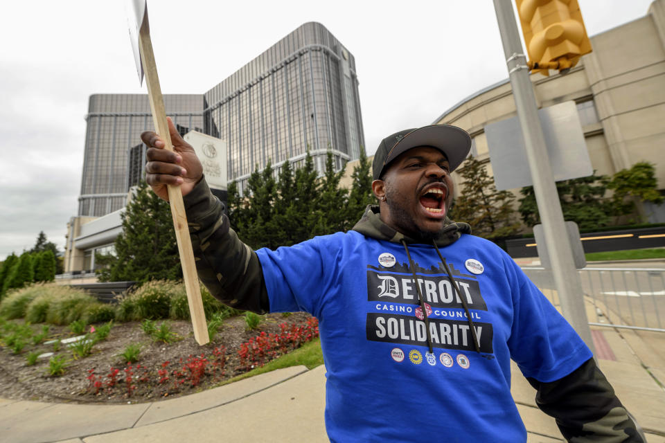 Richard Hartsfield, a count room attendant at the MGM Grand Detroit, chants slogans as he walks the picket line during a strike in front of the casino, in Detroit, Tuesday, Oct. 17, 2023. (David Guralnick/Detroit News via AP)