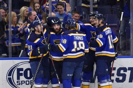 Mar 19, 2019; St. Louis, MO, USA; St. Louis Blues left wing Pat Maroon (7) celebrates with teammates after scoring during the third period against the Edmonton Oilers at Enterprise Center. Mandatory Credit: Jeff Curry-USA TODAY Sports