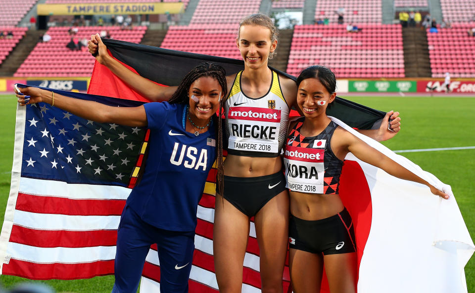 <p>Tara Davis of The USA, Lea-Jasmin Riecke of Germany and Ayaka Kora of Japan celebrate after winning medals in the final of the women's long jump on day four of The IAAF World U20 Championships on July 13, 2018 in Tampere, Finland. (Photo by Charlie Crowhurst/Getty Images for IAAF)</p> 