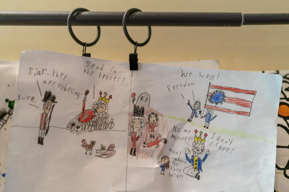 A drawing by 11-year-old Sylvia Holm, depicting America's victory over the British in the Revolutionary War, hangs in her home in Louisville, Ky., Saturday, June 3, 2023. (AP Photo/David Goldman)