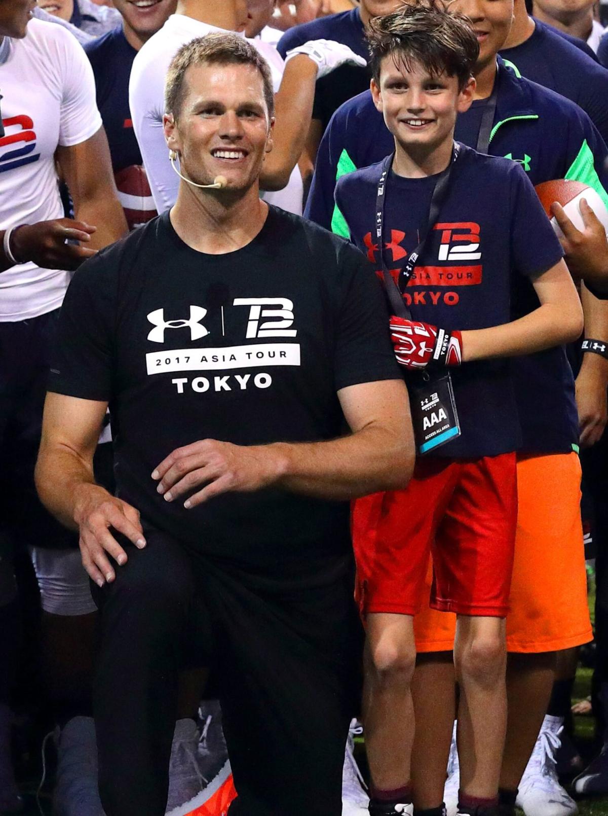 Tom Brady Shares Sweet Hug with His Son to Celebrate NFC Playoff Win