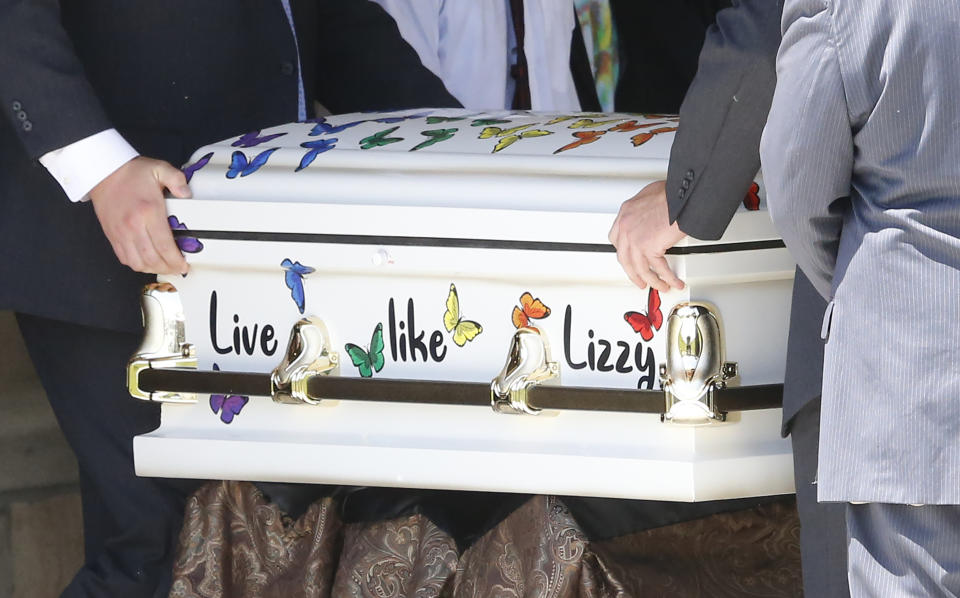 The casket for Elizabeth "Lizzy" Shelley, a 5-year-old girl who police say was taken from her home and killed by her uncle, is carried following services Tuesday, June 4, 2019, in Logan, Utah. Her uncle, Alex Whipple, is charged with killing her after his sister let him spend the night at the family's home, prosecutors said. Elizabeth "Lizzy" Shelley disappeared May 25 and was found dead less than a block from her home after a five-day search. (AP Photo/Rick Bowmer)