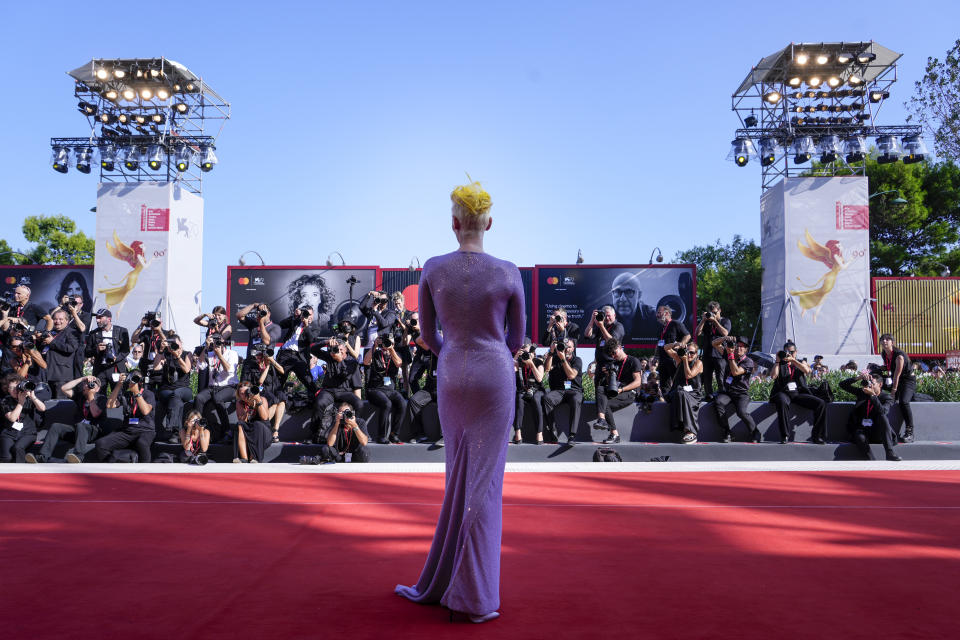 Tilda Swinton poses for photographers upon arrival at the premiere of the film 'The Eternal Daughter' during the 79th edition of the Venice Film Festival in Venice, Italy, Tuesday, Sept. 6, 2022. (AP Photo/Domenico Stinellis)