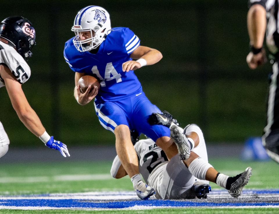 Wyatt Christensen of Waukee Northwest is tackled by Dane Milton of Sioux City East on Friday at Waukee Northwest High School.