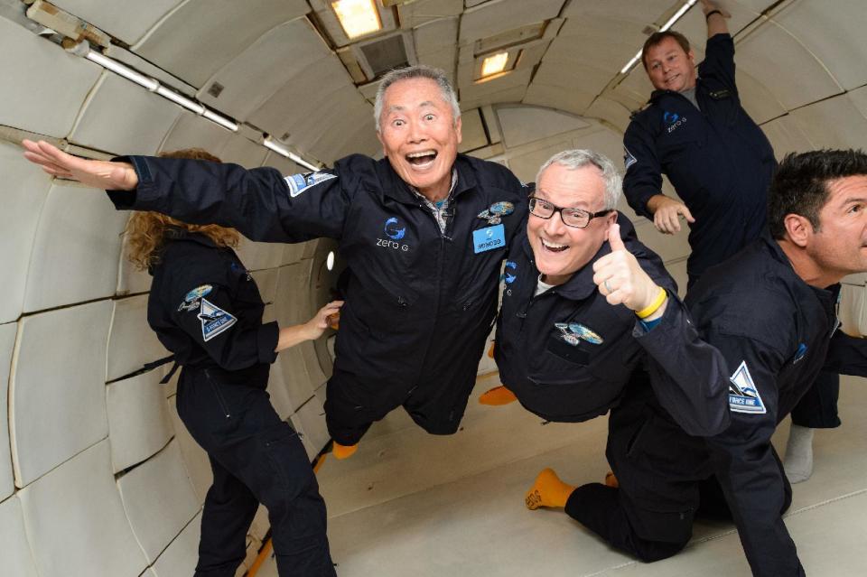 George Takei and his husband, Brad Altman, posed in zero-gravity aboard a Zero-G flight Aug. 17, 2016.