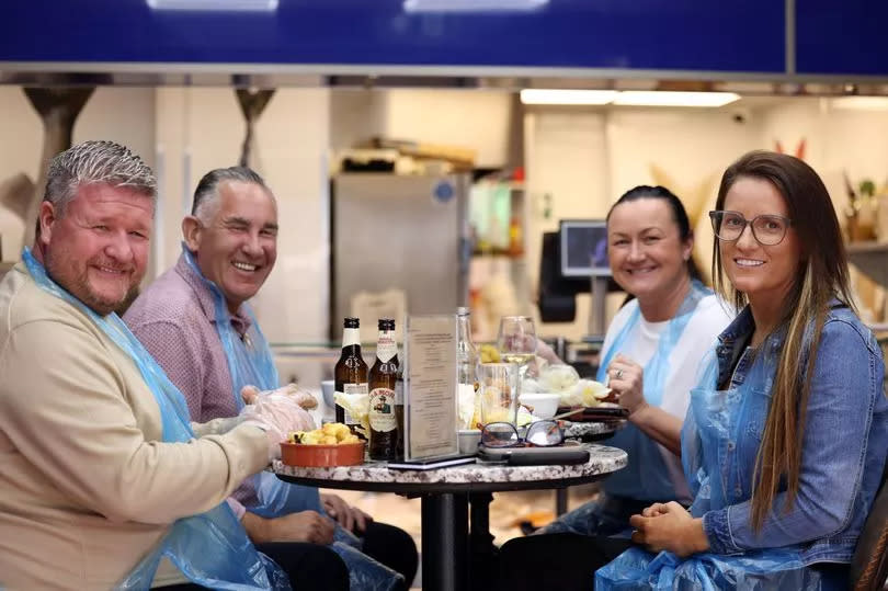 A group of people enjoying a seafood boil at Fish on Durham Road, Low Fell