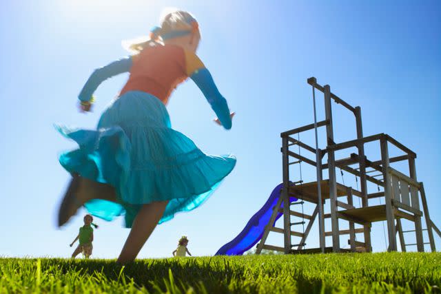 <p>Getty</p> A stock image of a child running in a playground