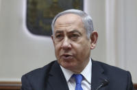 Israeli Prime Minister Benjamin Netanyahu chairs the weekly cabinet meeting in Jerusalem, Sunday, Feb. 16, 2020. (Gali Tibbon/Pool via AP)