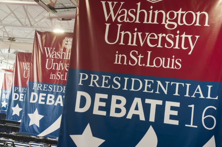 Banners are seen in the media center prior to the second presidential debate at Washington University in St. Louis, Missouri, on October 9, 2016