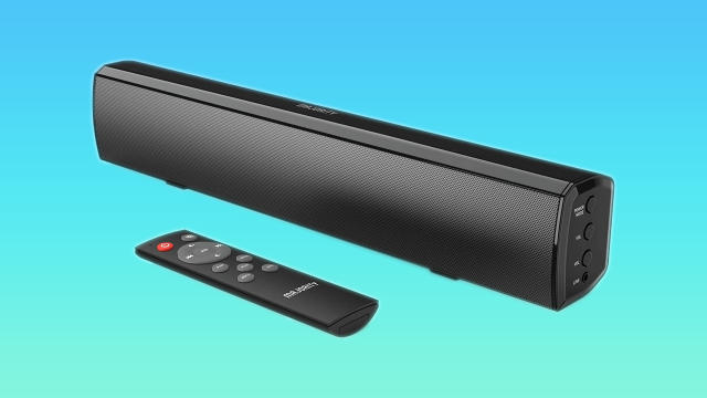 Black soundbar with remote.