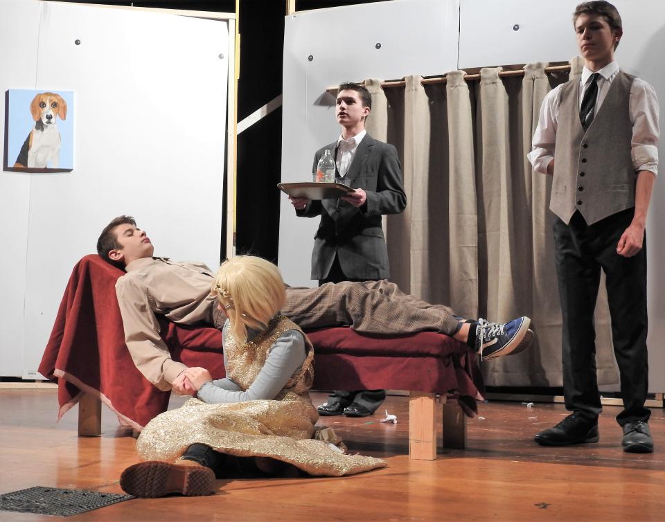 Olivia Crouso, Jacob Miletti, John Stamper and Caden Griffiths rehearse a scene in "The One-Act Play That Goes Wrong" at Coshocton High School. There are about 25 students involved on stage and behind the scenes in the CHS version of the play.