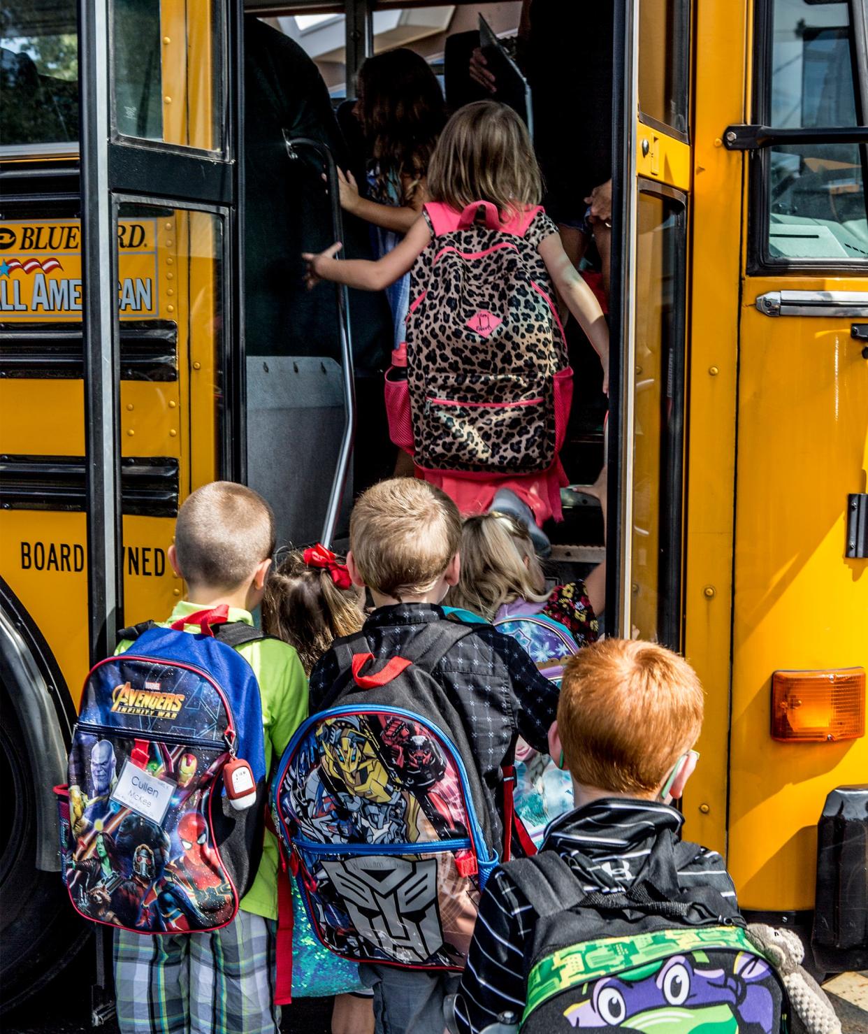 Students crown onto their bus. Many Licking County districts are in need of bus drivers and substitute bus drivers during the COVID-19 pandemic.