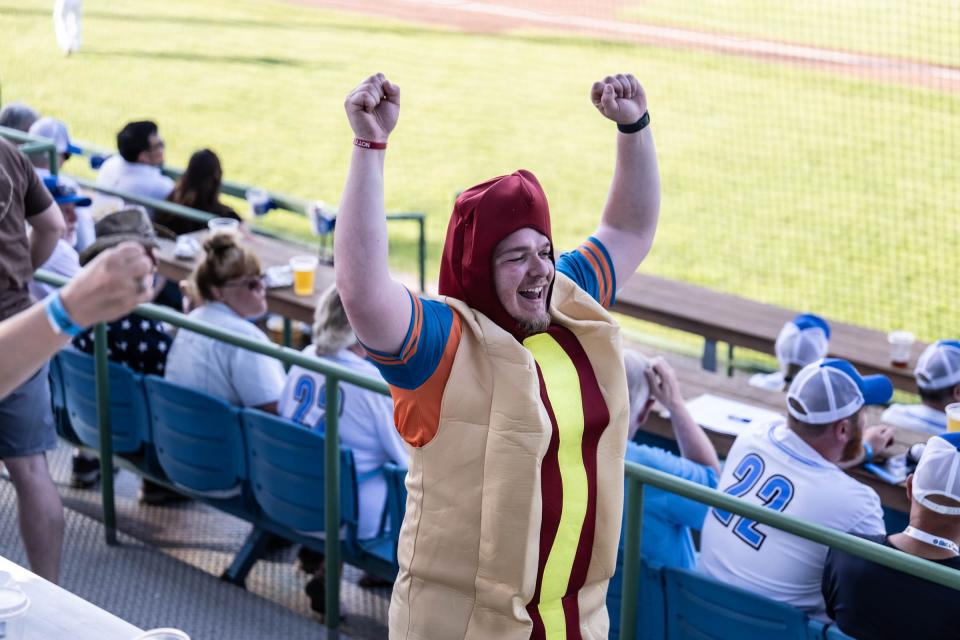 Gregory Pietsch (Hot Dog) leads the crowd in some singing during the Battle Jacks opening night at C.O. Brown Stadium on Monday, May 30, 2022