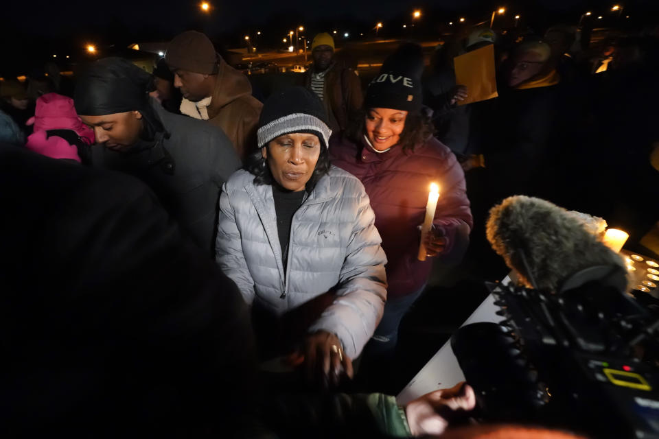 RowVaughn Wells, mother of Tyre Nichols, who died after being beaten by Memphis police officers, leaves at the conclusion of a candlelight vigil for Tyre, in Memphis, Tenn., Thursday, Jan. 26, 2023. (AP Photo/Gerald Herbert)
