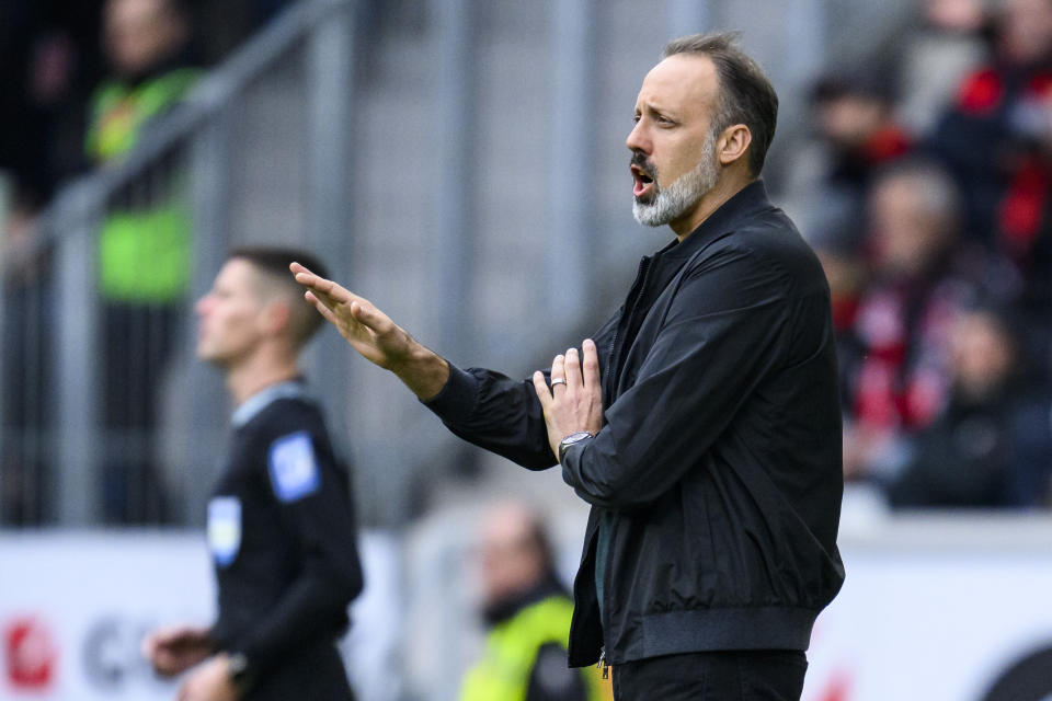 Hoffenheim coach Pellegrino Matarazzo gestures during the German Bundesliga soccer match between TSG 1899 Hoffenheim and SC Freiburg in Freiburg im Breisgau, Germany, Sunday March 12, 2023. (Tom Weller/dpa via AP)