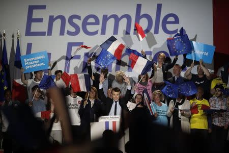 Emmanuel Macron, head of the political movement En Marche !, or Onwards !, and candidate for the 2017 presidential election, attends a campaign rally in Arras, France, April 26, 2017. REUTERS/Benoit Tessier