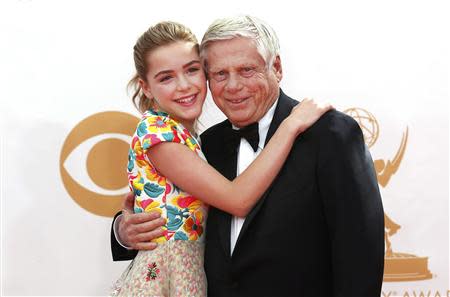 Actors Kiernan Shipka and Robert Morse from the AMC series "Mad Men", pose as they arrive at the 65th Primetime Emmy Awards in Los Angeles September 22, 2013. REUTERS/Mario Anzuoni (UNITED STATES Tags: ENTERTAINMENT) (EMMYS-ARRIVALS)