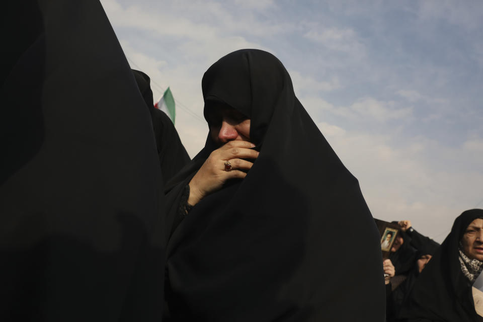 Protesters demonstrate over the U.S. airstrike in Iraq that killed Iranian Revolutionary Guard Gen. Qassem Soleimani in Tehran, Iran, Jan. 3, 2020. Iran has vowed "harsh retaliation" for the U.S. airstrike near Baghdad's airport that killed Tehran's top general and the architect of its interventions across the Middle East, as tensions soared in the wake of the targeted killing. (AP Photo/Vahid Salemi)