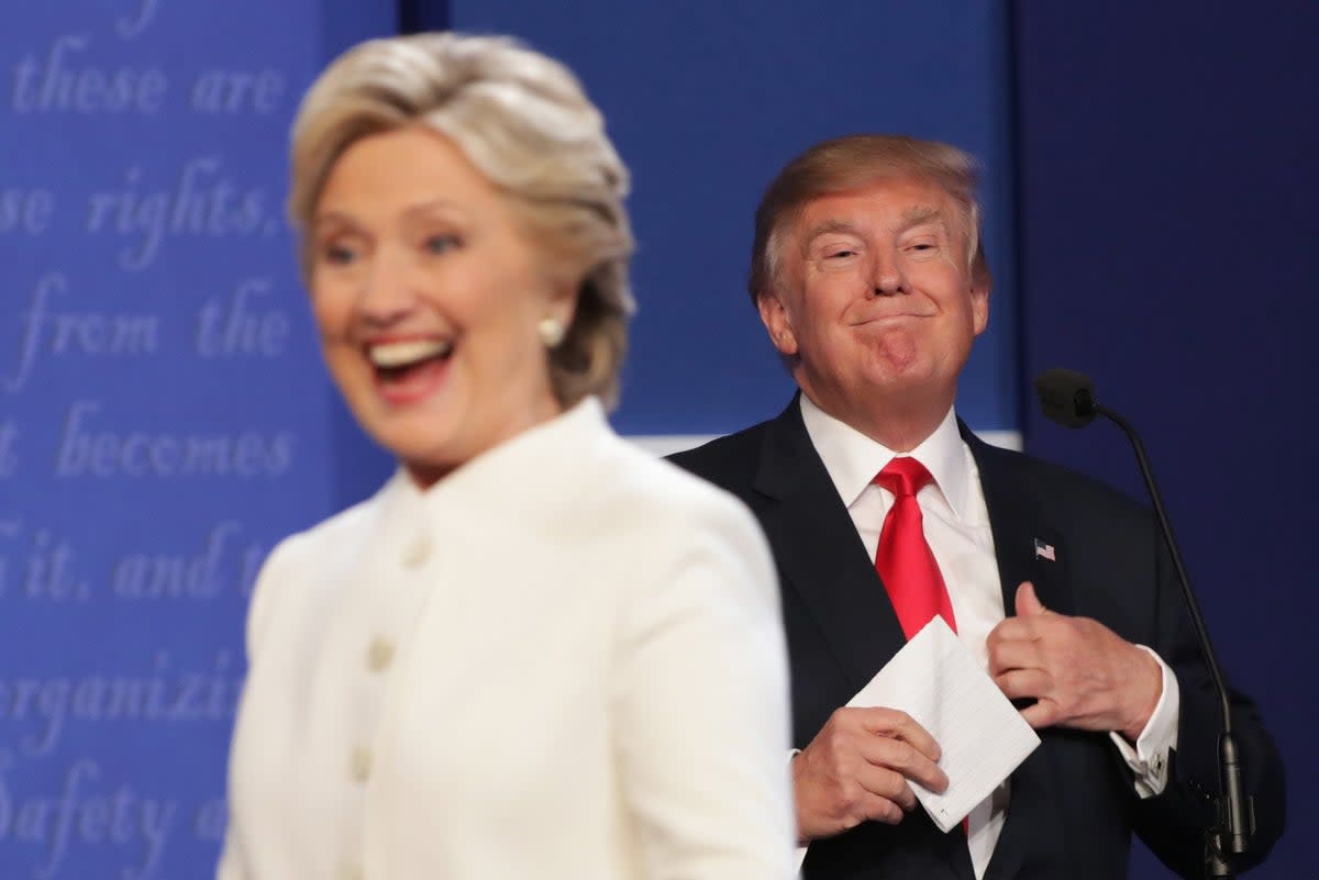 Former Secretary of State Hillary Clinton and Donald Trump at a presidential campaign debate in October 2016 (Getty)