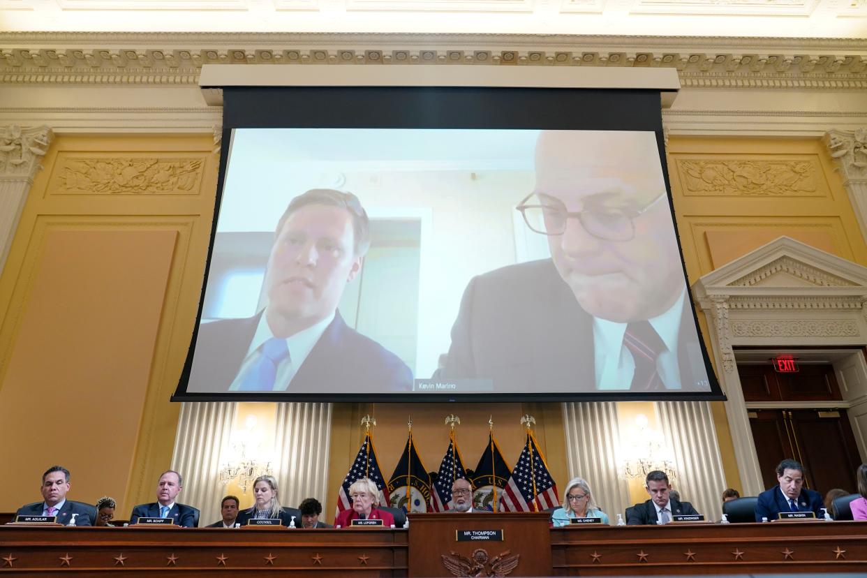 A video exhibit with Bill Stepien, former Trump campaign manager, left, plays as the House select committee investigating the Jan. 6 attack on the U.S. Capitol continues to reveal its findings of a year-long investigation, at the Capitol in Washington, Monday, June 13, 2022. 