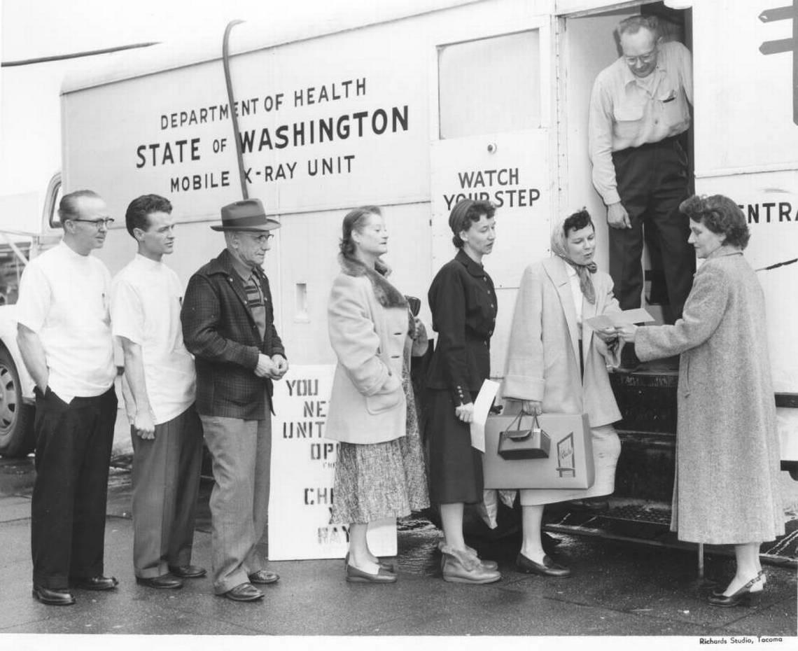 Local residents lined up for free chest X-rays at a mobile unit sponsored by the Department of Health. The van traveled around Pierce County, and these shoppers in downtown lined up March 12, 1957. By early February, 1957, more than 58,000 people had received the free chest X-rays.