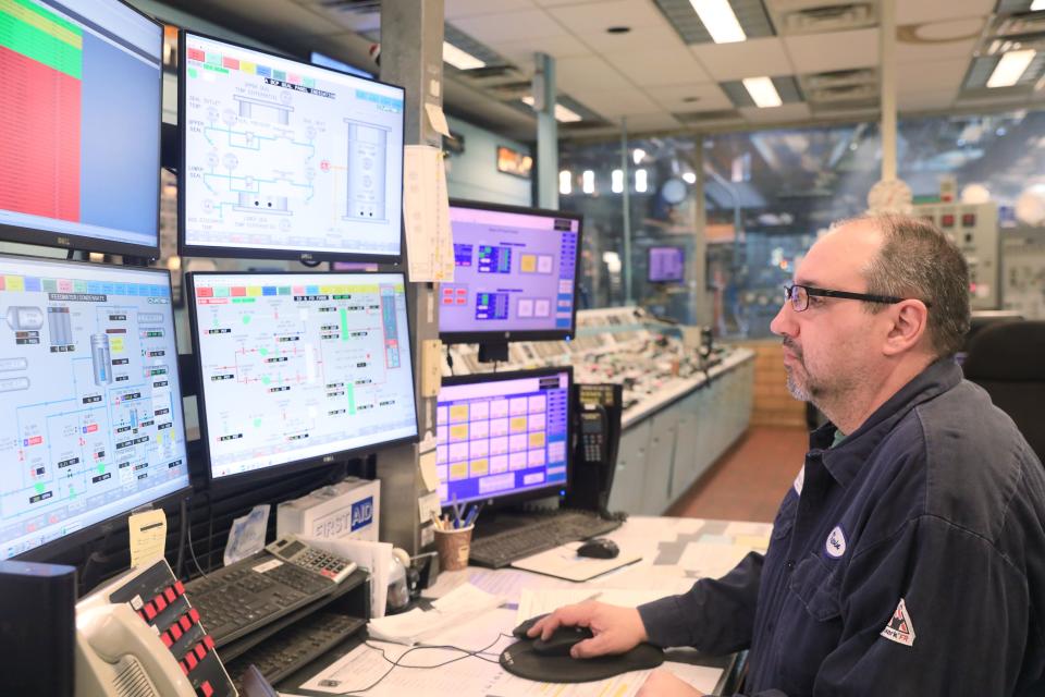Shift supervisor Kegin Nagy monitors the plant while in the control room inside the Danskammer power plant on December 9, 2022. The plant uses natural gas to produce steam which spins the turbines and creates electricity. 