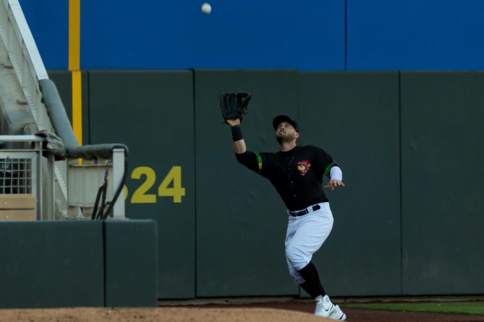 El Paso Chihuahuas' Preston Tucker (50) catches the ball at a PCL Triple-A game against Oklahoma City Dodgers on Thursday, June 8, 2023, at Southwest University Park in Downtown El Paso, Texas.