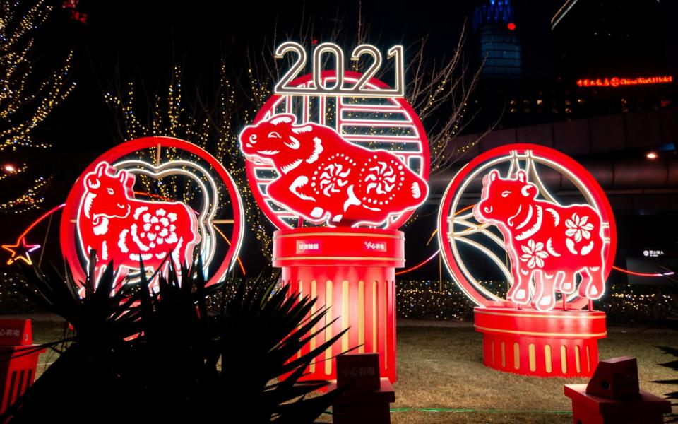 Street decorations are pictured in Guomao Business District as China celebrates Chinese New Year 4719, the Year of the Ox.  - Artyom Ivanov/TASS 