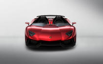 Starting with the everyday 700-hp Aventador, Lamborghini taunted the bull even further by removing the roof, adding several aerodynamic panels and generally shucking weight from a car that only had 3,472 lbs. to begin with. Even the seat fabrics have been swapped for something Lamborghini calls "Carbonskin," a fabric made from carbon fibers that's at least a decade away from being used on a teenager's hat. With no windshield, the interior has to get some form of waterproofing; the rear mirror pops up like Wall-E's head from the center of the dash. It and the roll bars behind the driver are the highest points in the car.