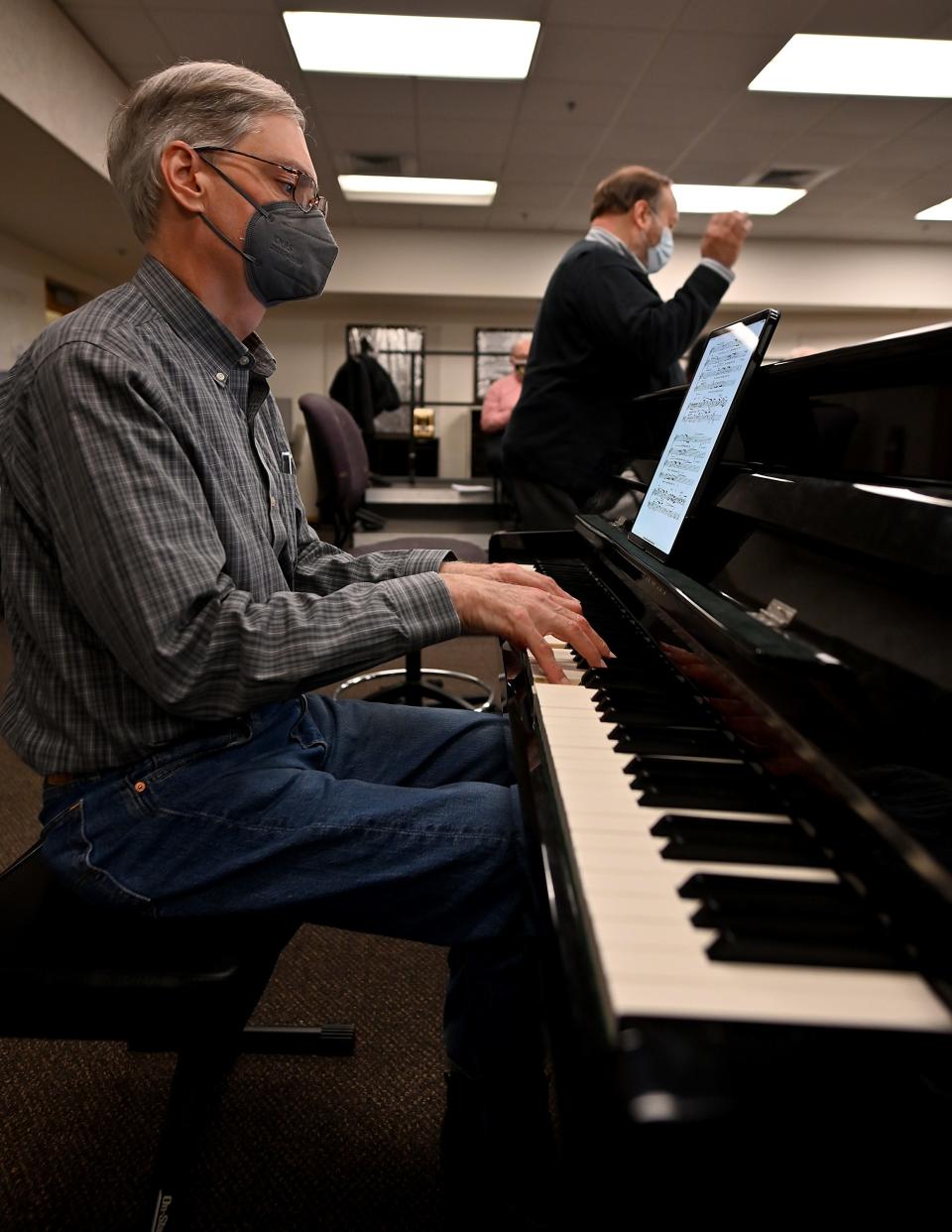 Pianist Mark Bartlett of Marlborough accompanies the chorus at a recent rehearsal.