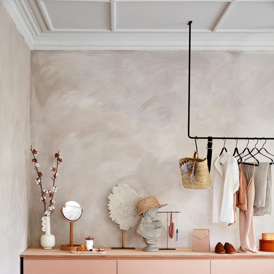 Dressing room with plaster walls and panelled ceiling