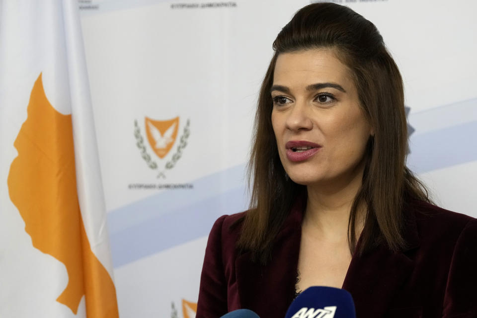 Cypriot Energy Minister Natasa Pilides talks to the media during a press conference at the Energy ministry in Nicosia, Cyprus, Thursday, Jan. 27, 2022. Pilides said that the European Union has earmarked 657 million euros ($736 million) for the construction of a a 2,000 megawatt undersea electricity cable linking the power grids of Israel, Cyprus and Greece. (AP Photo/Petros Karadjias)