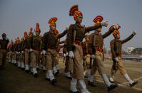 Assam police personnel participate in a parade to mark Republic Day in Gauhati, India, Sunday, Jan. 26, 2020. Sunday's event marks the anniversary of the country's democratic constitution taking force in 1950. (AP Photo/Anupam Nath)