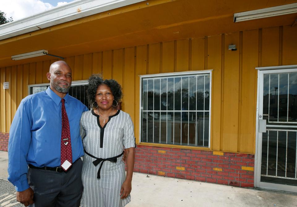 David Lucas and his wife Claudette are shown in front of their restaurant, A Golden Taste of Jamaican Food and Treats, on Mary McLeod Bethune Boulevard in Daytona Beach. Lucas is still trying to digest all the new laws passed in Florida the past two years that impact voting, education, immigration, guns and LGBTQ+ people.