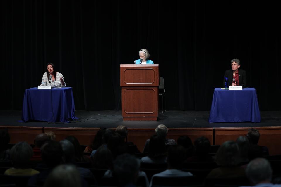 Democrat Jamie McLeod-Skinner, right, and Republican Lori Chavez DeRemer, left, participate in a debate for Oregon's 5th Congressional District at Lakeridge High School in Lake Oswego, Ore., Monday, October 17, 2022. (AP Photo/Steve Dipaola)