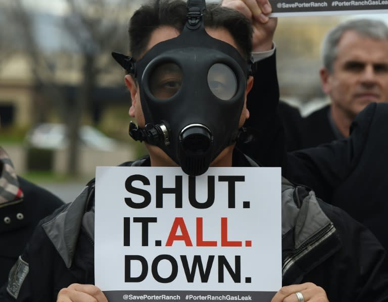 A Porter Ranch resident wears a gas mask as he joins others in a protest outside a meeting of the Air Quality Management Board over the continuing gas leak, on January 23, 2016